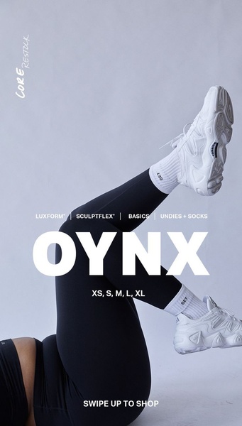 A clean, studio-lit creative showcasing leggings and sneakers with minimal text overlays to announce a product restock.